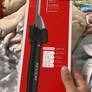 I’m selling a revlon heating curler silver and black